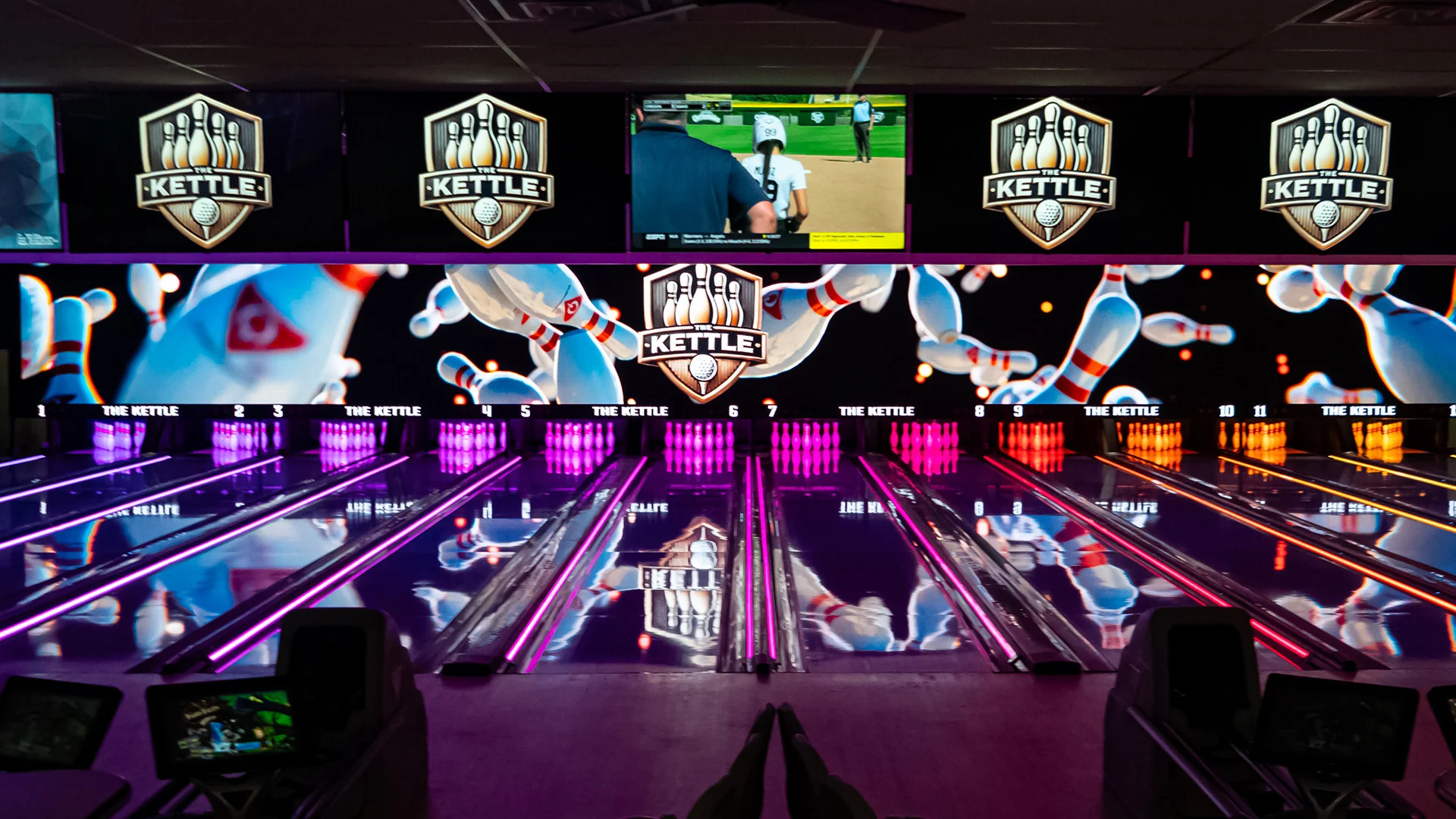 HyperBowling lanes lit up with colored bumper targets